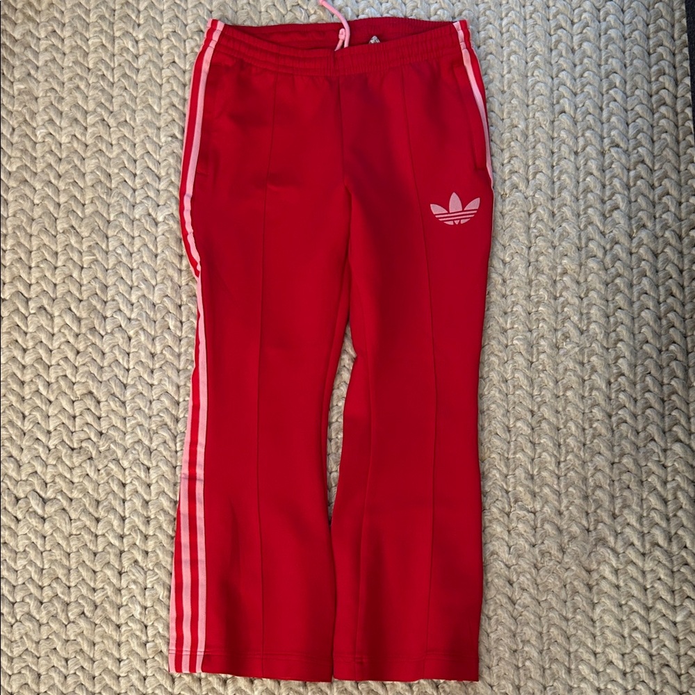 Adidas original Red track pants with Pink Stripes